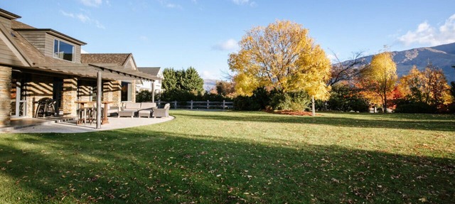 Luxury home with swimming pool, tennis court and pool table.