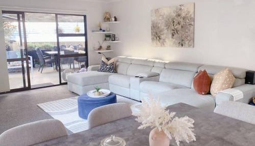 Modern three bed two and a half bath with in and outdoor flow plus study