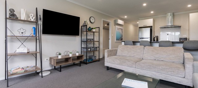 Modern work-ready Hamilton home with sauna and EV charging