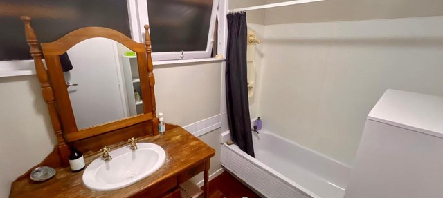 Room In flat is 1st door past carport