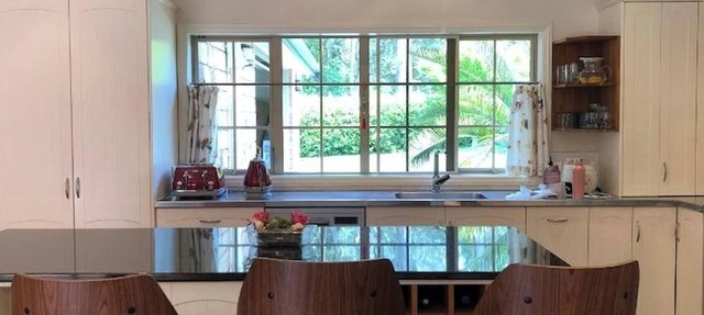 Serene Whangarei lifestyle luxurious modern home with trees and Garden Views