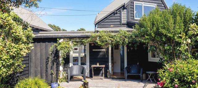 The Black Cottage at Putiki Bay