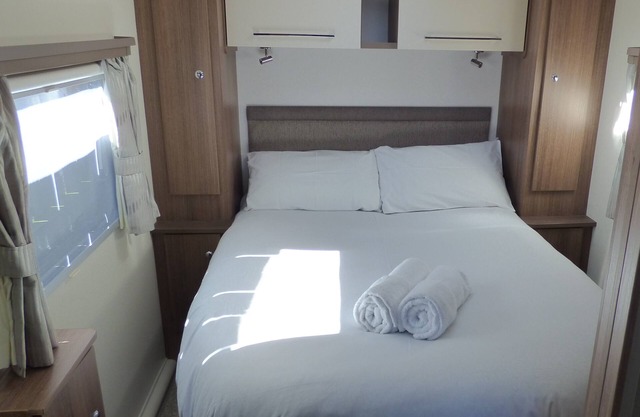 8 mins walk to town from your own private place