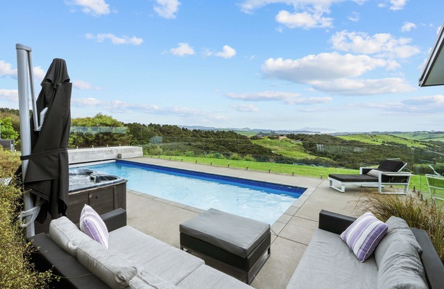 Exclusive home with uninterrupted views of the Hen & Chicks, set in Native Bush