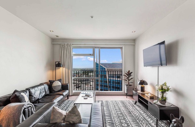 Luxury 2BR Apt– Pool, Gym, Prime Spot Zodiak Stays