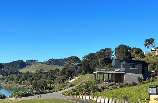 Rangitahi paradise. A modern 4 bedroom home overlooking the bay.