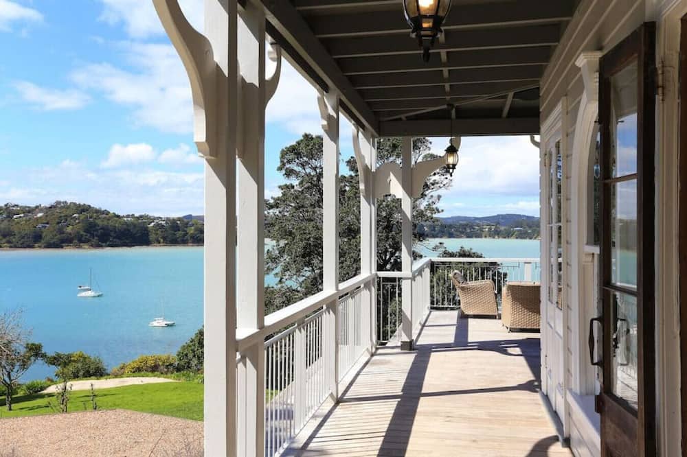 Oneroa House | With a private beach and secluded location