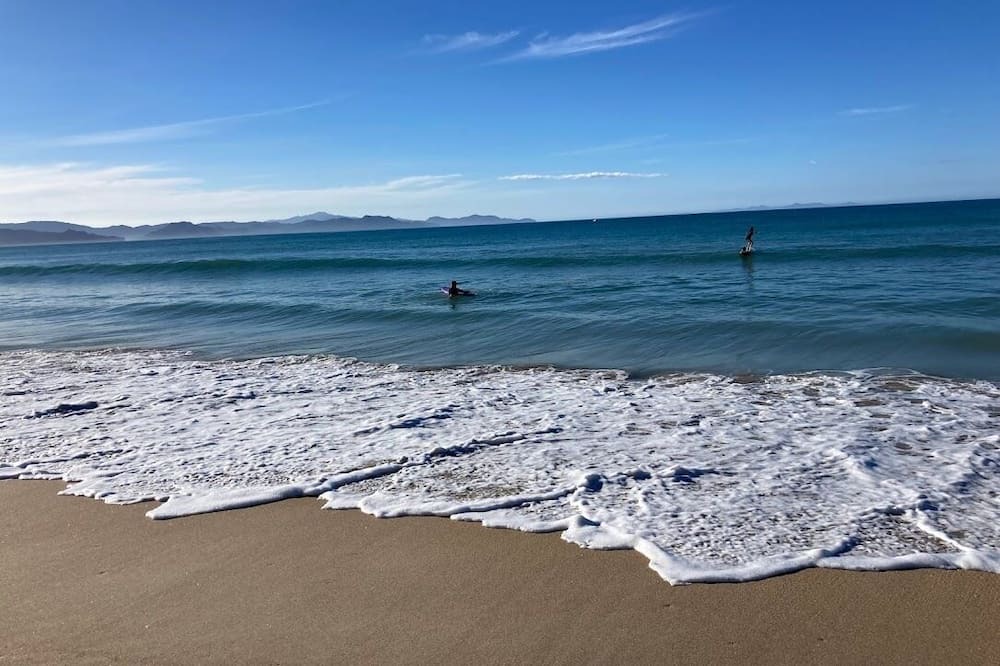 Kuaotunu Cottage | "Beach Baby" Cottage is a 3 min flat walk to the long sandy beach. Fab swimming