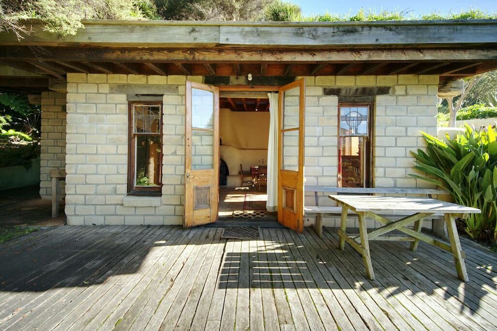 Pigeon Bay Apartment | The Mud House— earth studio in Pigeon Bay with views, wood-fired sauna & bath!