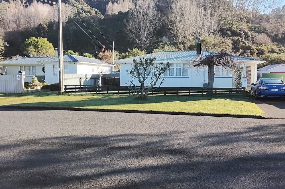 Whanganui House | Frances's Patch with a rural backdrop in whanganui