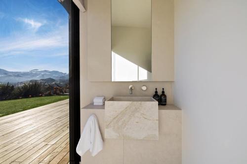 Queenstown City Centre Villa | Noa By The Lake by MajorDomo - Lake view, spa pool, outdoor fireplace