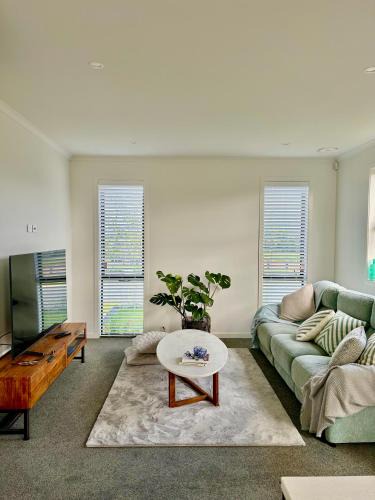 Hamilton House | Modern ensuite master bedroom in a shared home