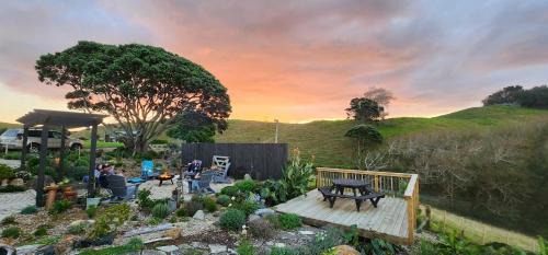 Karioitahi Villa | Historic Luxury Escape with Twin Outdoor Baths
