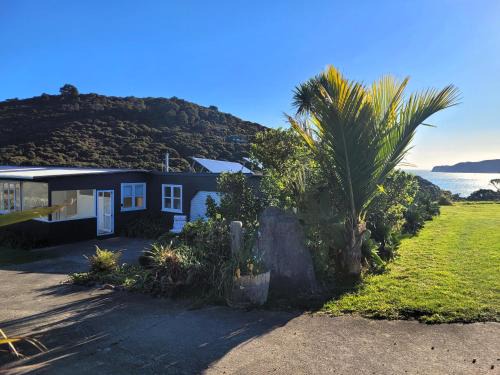 Tryphena House | Taumata Farmhouse - A Classic Kiwi Bach Escape
