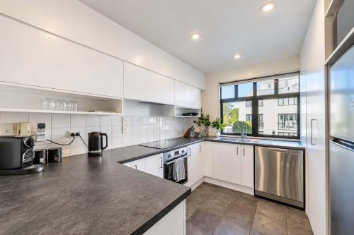 Christchurch City Centre House | Elegant 3-Storey Townhouse with Garage Parking by Latimer Sq