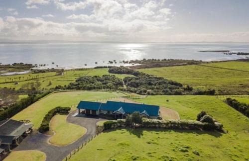 Clarks Beach Villa | Luxury Beachfront Farm Retreat w Private Beach
