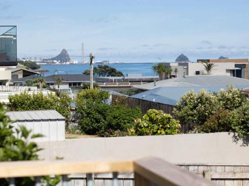 Rewa House | Blue Water Cottage - with beachfront coastal views