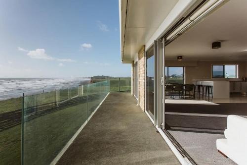 Bell Block Apartment | ABC on Wanaka Bay - beachfront home w. ocean views