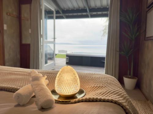 Ngongotaha House | Stillwater Cottage - Stunning Lakefront Location with Spa & Kayaks