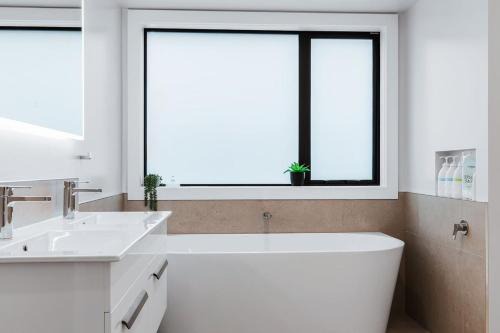 Wharewaka House | Premium Lake Taupo Home - Walk to Lake & Café