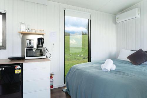 Kawaha Point House | Aorangi Peak Cabins 7 by Tiny Away