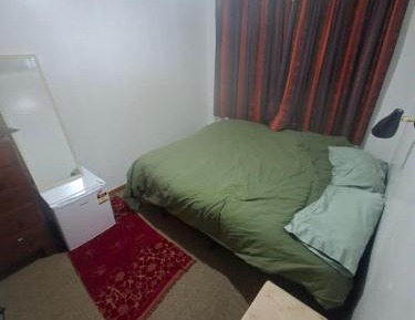 Standard Double Room with Shared Bathroom