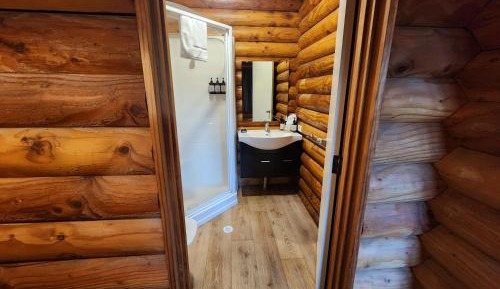 1 single bed in a 3 Bed Log Cabin Dorm (No Bunks)