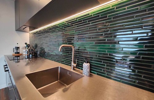 Omaui House | Designer Red House Omaui