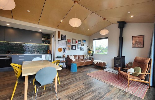 Omaui House | Designer Red House Omaui