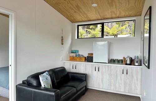 Moetapu Bay Cabin | A cosy two bedroom off-grid cabin, the perfect place to rest, relax & recharge.