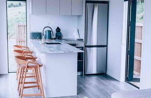 Tawharanui Cabin | Omakana Cottage, Omakana Cottage with Farm Views & Cedar Hot Tub