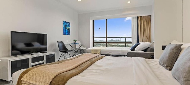 Skyline Sojourn Studio with Parking and Sea Views