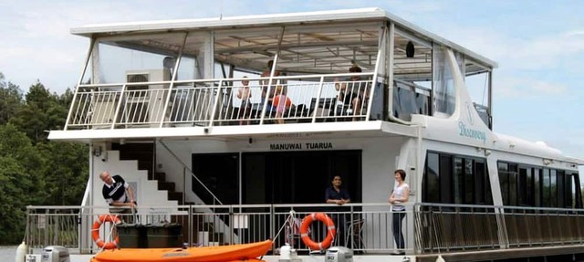 Floating Luxury Getaway on the Peaceful Waikato River of New Zealand