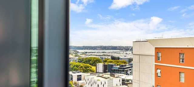 Zodiak Stays: Cozy CBD 2BR Near Top Dining Spots