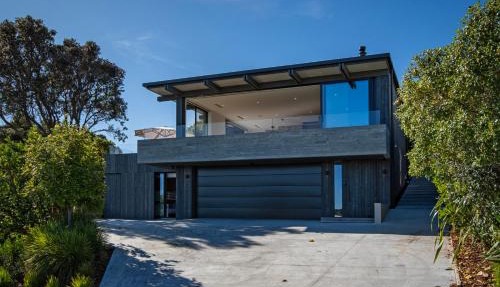 Black House Red Roof - Langs Beach Holiday Home