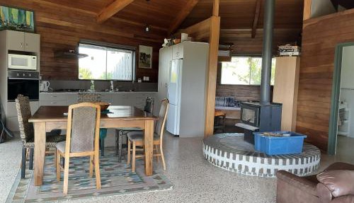 Rustic farm chalet on lifestyle farm block