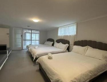 3 double beds and 2 sofa beds studio