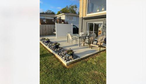 Stylish 1BR Retreat | Patio | Walk to Shops | Parking