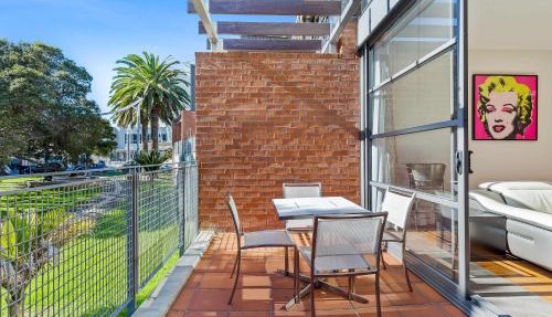 Sleek Modern Pad next to Spark Arena Zodiak Stays