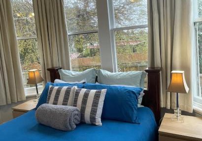 Comfy Hideaway with Queen Bed and a Trundler