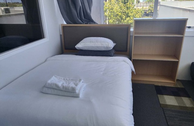 6 Beds including 1 DBL Bed, 1 Single Bed, 4 Singgle Sofa Bed in 1 Room & 1 Lounge